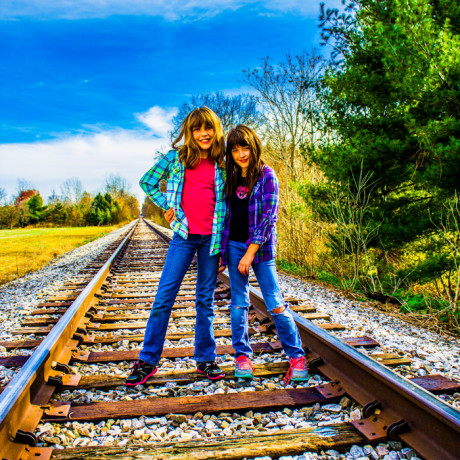 photo kid train tracks